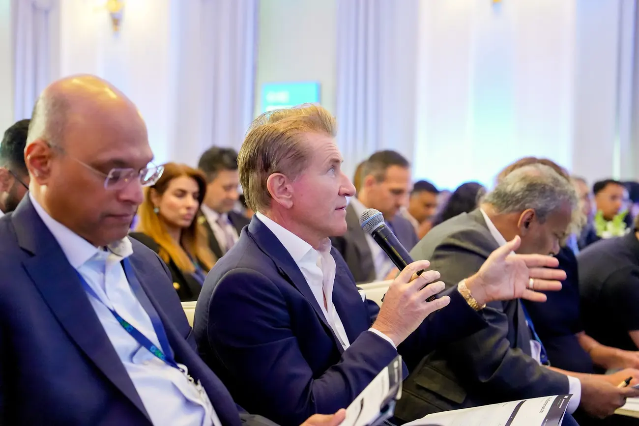 Robert Herjavec in the judges' row, mid-conversation